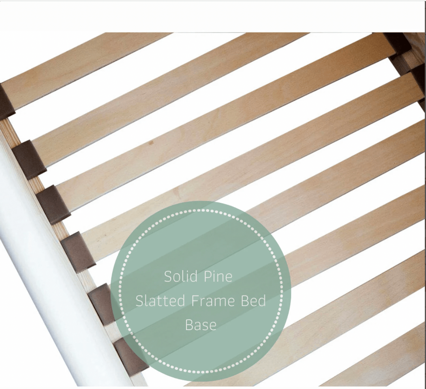 White wooden bed for a child with a drawer