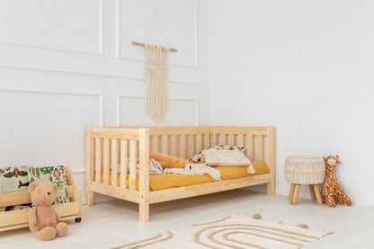 Wooden Bed for a Child with a Drawer